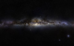 Download Glowing Milky Way At The Dark Space Wallpaper | Wallpapers.com