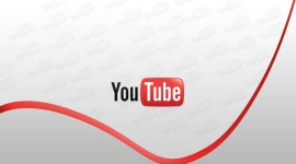 Download A bright Youtube logo against a black background highlighted by neon lights. | Wallpapers.com