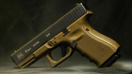 Download Bronzed Glock 19 Gen 4 Wallpaper | Wallpapers.com
