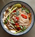 Download A hearty bowl of Pho – Authentic Vietnamese Cuisine Wallpaper | Wallpapers.com