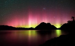 Download Tasmania Pink Yellow Aurora Lights Wallpaper | Wallpapers.com