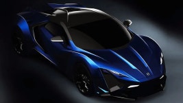 Download W Motors Blue Sports Car Wallpaper | Wallpapers.com