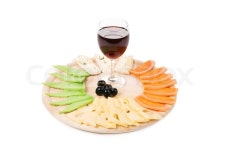 Red wine glass and cheese table. Isolated on a white background. | Stock Photo | Colourbox