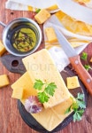 Cheese on board and on a table | Stock Photo | Colourbox