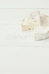 Camembert cheese on the table | Stock Photo | Colourbox