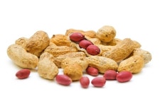 Nuts. Roasted Peanuts close up on white background. | Stock Photo | Colourbox