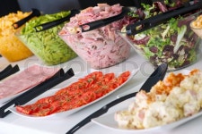 Dishes of assorted food for salad buffet in a restaurant | Stock Photo | Colourbox