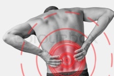 Acute pain in a male lower back. Monochrome image, isolated on a white background. Pain area of red color. | Stock Photo | Colourbox