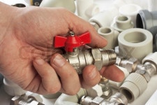 Set plumbing fittings in his hand | Stock Photo | Colourbox