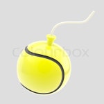 Glossy tennis ball as a bomb isolated on grey | Stock Photo | Colourbox