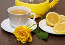 Tea with lemon and yellow rose. | Stock Photo | Colourbox