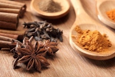 Herbs and Spices over wooden background | Stock Photo | Colourbox
