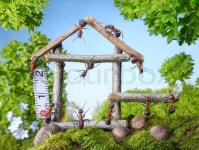 Team of ants constructing wooden house in forest, teamwork, ant tales | Stock Photo | Colourbox
