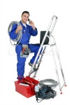 Electrician with mobile telephone | Stock Photo | Colourbox