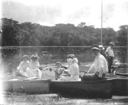 Florida Memory • People sitting in boats on the shore 