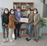 금정구 치매안심센터, 서1동에 치매 관련 도서 전달