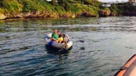 Coastguard concern after children found in supermarket dinghy off coast - Independent.ie Coastguard concern after children found... 