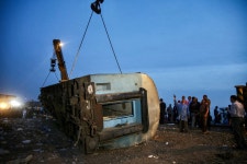 11 killed, 98 injured after train derails near Cairo At least 11 killed, 98 injured after train derails outside Cairo