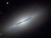 Bad Astronomy | Solving the riddle of the edge-on galaxy NGC 5866 Solving the riddle of the edge-on galaxy NGC 5866