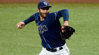 Rays clinch top seed, then beat Phillies 4-3
