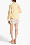 Pastel yellow Oversized embroidered cotton-blend fleece sweatshirt | GANNI | THE OUTNET