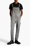 MOSCHINO Logo-embroidered faded denim overalls | Sale up to 70% off | THE OUTNET