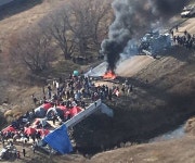 Chaos at Dakota Access Pipeline protest as fires break out and 141 people are arrested | The Sun Violence erupts at Dakota Access... 
