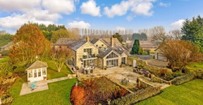 Sprawling five-bed country estate once home to champion racing dynasty that boasts fenced paddock and stables on sale for £1.7m... 