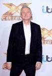 Louis Walsh slams Robbie Williams for bringing wife Ayda to work and says ‘she doesn’t have the X Factor’ ahead of... 