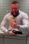 Conor McGregor screams while flexing in mirror on night out and says life is a b**** after pub is petrol bombed | The Irish Sun... 