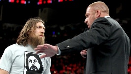 Daniel Bryan is assaulted by Triple H and Stephanie McMahon: photos | WWE Daniel Bryan is assaulted by Triple H and Stephanie... 