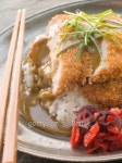 Plated Tonkatsu with Vinegar RiceCurry Sauce and Pickled red Radish 이미지 (84465816) - 게티이미지뱅크 Plated Tonkatsu with...