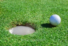 Golf Ball Next to Cup with Shallow Depth of Field 이미지 (96356458) - 게티이미지뱅크 Golf Ball Next to Cup with Shallow Depth...