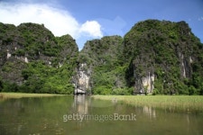 Cave Myeongdong(동굴명동) | Rice field and limestone cave mountains along Ngo Dong river... Rice field and limestone cave mountains along Ngo Dong river