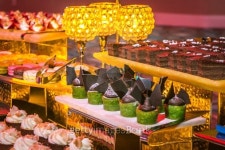 table with assortments of desserts and glass covered candles 이미지 (469522553) - 게티이미지뱅크 table with assortments of...