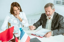 The business people working together at ... | Stock image | Colourbox