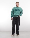주식회사 오베이153 | 오베이(OBEY) | 오베이 컬리지 스웨트셔츠 그린 & College-Sweatshirt in Grun mit Pigment-Logo und Rundhalsausschnitt...
