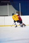 유토이미지 | ice hockey player in action kicking with stick