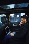 베이직커뮤니케이션스(Basic communications) | Businessman communicating on smartphone and through internet | 유토이미지 | 상세페이지 | 베이직샵 | 사진 | 20603225