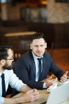 베이직커뮤니케이션스(Basic communications) | Business colleagues communicating during a coffee break | 유토이미지 | 상세페이지 | 베이직샵 | 사진 | 20604768