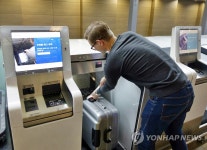 SK텔레콤, 인천공항 자동탑승수속 전용구역 구축 | 연합뉴스