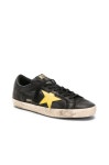 Golden Goose SUPERSTAR 스니커즈 in Black & Yellow Star | REVOLVE SUPERSTAR 스니커즈 from Revolve.com