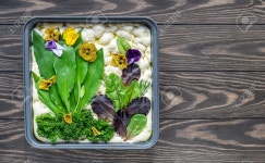 Sourdough Preparing To Bake Trendy Art Garden Focaccia Bread On The Wooden Table, With Wild Garlic, Edible Flowers, And Olive Oil. Top...