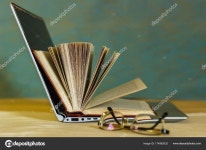 On the table are books and an open laptop. — Stock Photo © anatoliiSushko #174962632 On the table are books and an open laptop.