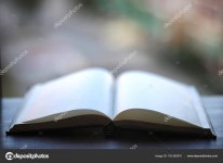 Open book and a table — Stock Photo © alexkich #181265570 Open book and a table