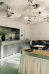 Tutto Bene balances steel and wood in Nightingale restaurant Tutto Bene balances steel and mirrors with wood and leather in...