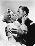 Olivia de Havilland and Errol Flynn in Charge of the Light B...