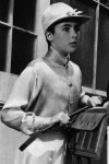 Elizabeth Taylor as a jockey in
