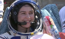 A Soyuz capsule carrying 3 crew from the International Space...